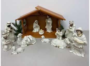 Porcelain Nativity Set With Wooden Manger