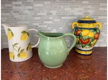 Two Decorative Pitchers And Canister