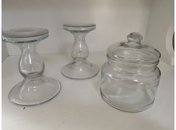 Two Glass Candle Holders And Covered Glass Canister
