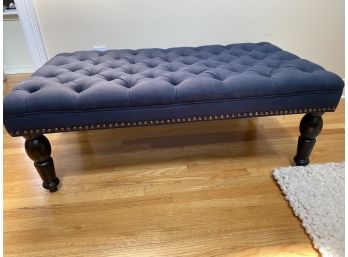 Blue Tufted Bench With Turned Wood Legs And Nailhead Trim