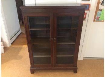Antique Glass Double Door Cabinet. All Three Shelves Are Glass Lined.