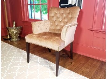 A Tufted Upholstered Armchair With Nailhead Trim