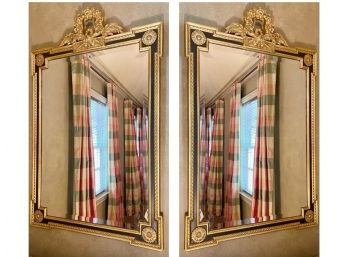 Pair Of Ornate Black And Gold Regency Style Beveled Mirrors