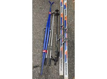 2 Sets Of Skis 1 Set Of Fisher Skis With Poles And A Pr. Of Kastle Skis With Ples