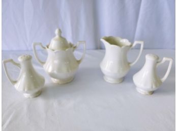 China Creamer  /  Sugar And Salt And Pepper Shakers