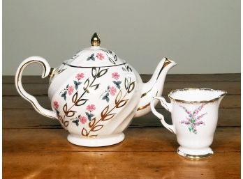 A Vintage Teapot And Creamer