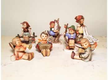 An Assortment Of Hummel Figurines