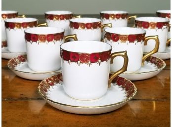 An English Demitasse And Saucer Set By Royal Crown Derby