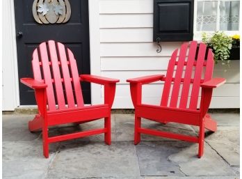 A Pair Of Red Adirondak Chairs By Polywood