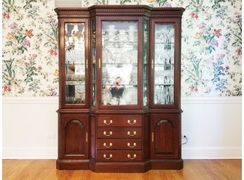A Lighted China Cabinet By Harden Furniture