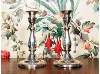 A Pair Of Vintage Weighted Sterling Candlesticks