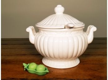 A Soup Tureen And Salt And Pepper Shakers