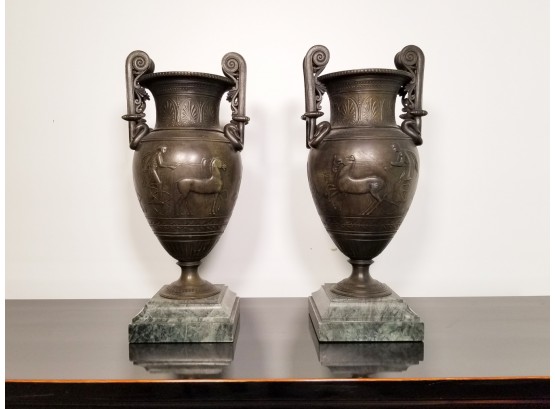 A Pair Of Late 19th Century Neoclassical Bronze Tone Urns On Marble Bases