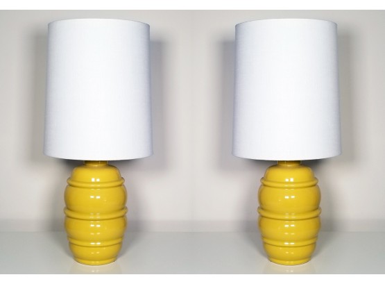 A Pair Of Glazed Ceramic Lamps With Modern Shades