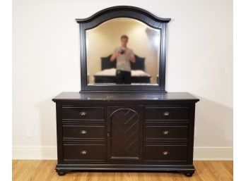 An Ebony Hardwood Mirrored Dresser