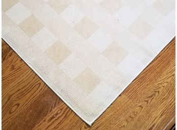 A Large Neutral Check-Patterned Rug