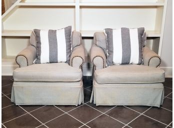 A Pair Of Upholstered Armchairs With Nailhead Trim