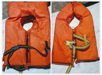 2 Life Vests One Is Brand New The Other Is Used - See Photos