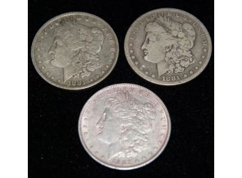 Three Morgan Silver Dollars- 1881, 1881-O, 1882