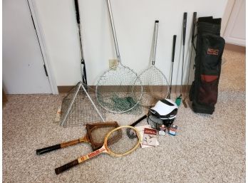 Assorted Mixed Sports Lot With Vintage Tennis Rackets, Aluminum Fishing Nets, Golf Club Bag W/ Three Clubs Etc