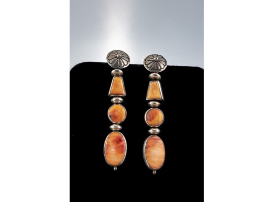 Silver Pierced Earrings With Orange Gemstones