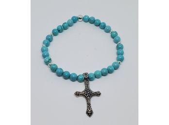 Blue Magnesite Stretch Bracelet With Cross Charm In Sterling