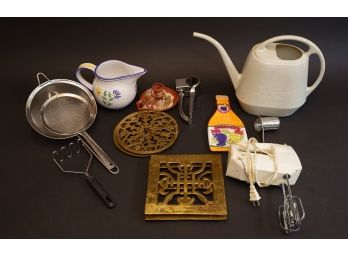Items For The Garden, Kitchen, And Table ( Trivets And A Greek Candleholder )