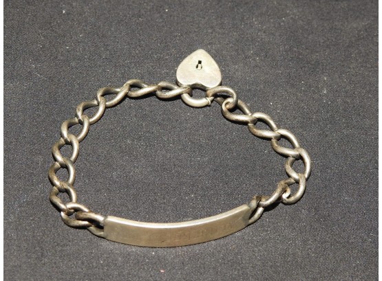 Sterling Silver ID Bracelet With Unusual Heart Lock Clasp