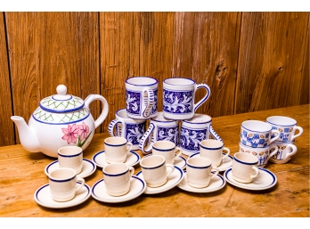 Tea Pot And Assorted Espresso Cups And Mugs