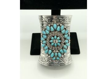 Wide Silver Cuff Bracelet With Turquoise Colored Stones