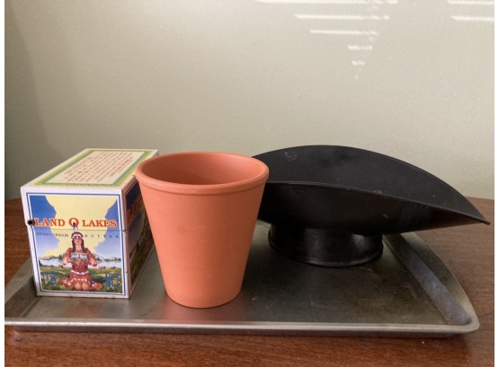 Metal Cookie Sheet, Metal Land O'lakes Card File, Flower Pot And A Metal Tray On A Stand.
