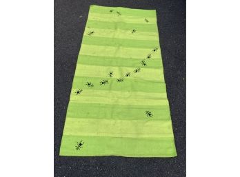 Green Stripped Area Rug With A Group Of Ants.