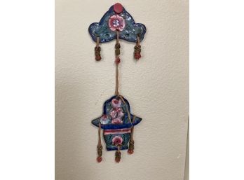 2 Decorative Wall Hangings One  Made Of Light Weight Wood With A Mirror, And One Of Clay