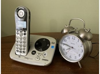 Telephone And An Alarm Clock So You Don't Miss Those Calls