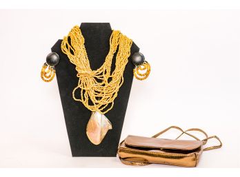 Golden Statement Necklace And Small Purse