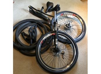 Assorted Bike Tires And Parts