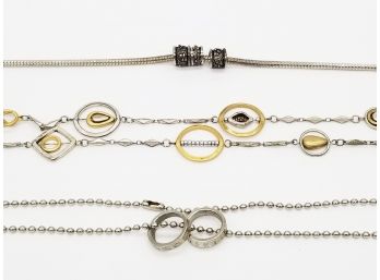 Three Necklaces In Silver Tones