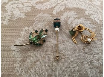 Three Gold Tone Pins Including Two Green Ones And A Stick Pin - Lot #6