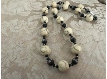 Lovely Bead Necklace In Black, Off-White, And Silver