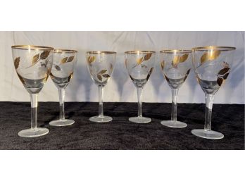 Six Wine Stems With Gold Tone Accents And Etched Florals