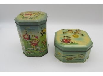 Two Vintage Tin Lithograph Illustrated Tin Boxes, The Urney Leprechan And Cow Jumped Over The Moon.