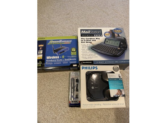 Phillips Headphones New In Box , Router , Wahl Hair Trimmer And Cordless Mailstation