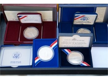 Group Of 4 Commemorative Silver Dollars- Constitution, The White House, Olympics, Ellis Island