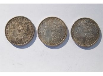 Three Morgan Silver Dollar Coins- 1880, 1882, 1883