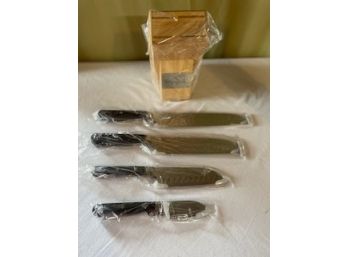 Wolfgang Puck Knife Set With Black Handles. Brand New.