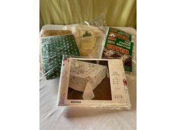 Assortment Of Kitchen Items Including Table Cloths, Sear Covers, Rug