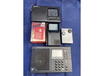 Lot Of Hand Held 3 Hand Held Radios And 1 Watchman Appears To Not Have Been Used
