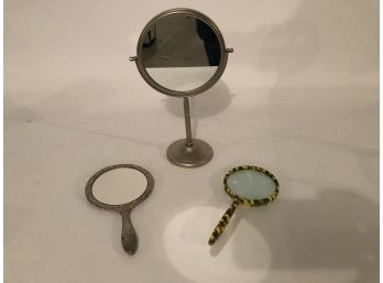 Two Mirrors And Magnifying  Glass