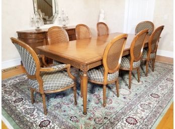 A Hardwood Extendable Dining Table And Round Back Chairs By Councill Furniture