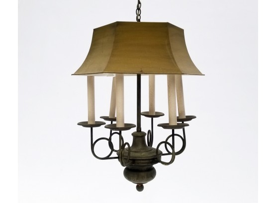 A Vintage Brass Light Fixture With Metal Shade